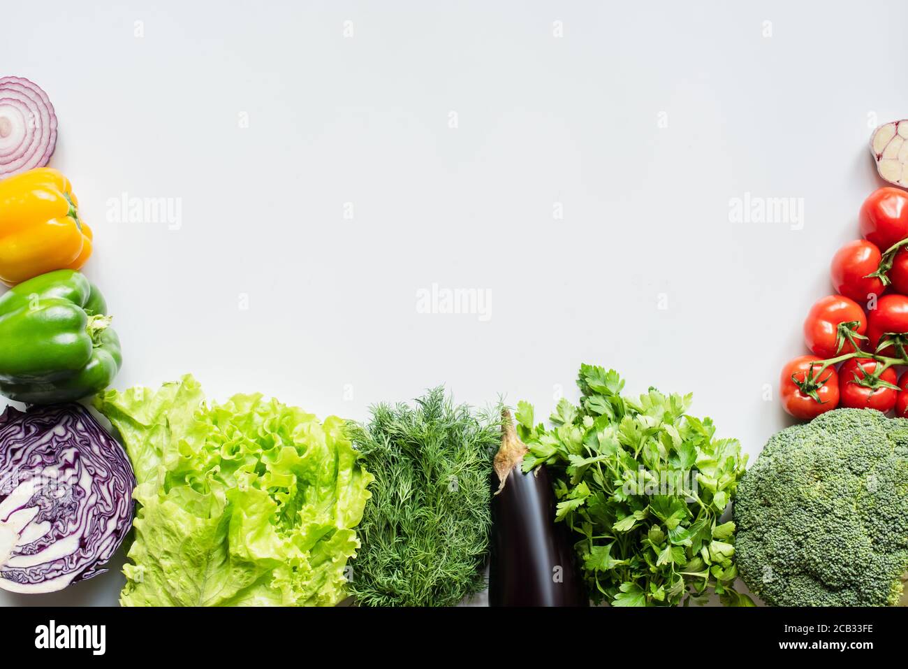 top view of fresh colorful vegetables on white background Stock Photo ...