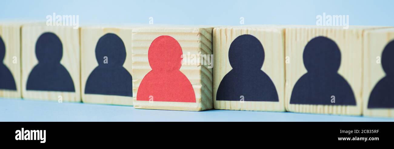 row of wooden blocks with black and red human icons on blue background ...