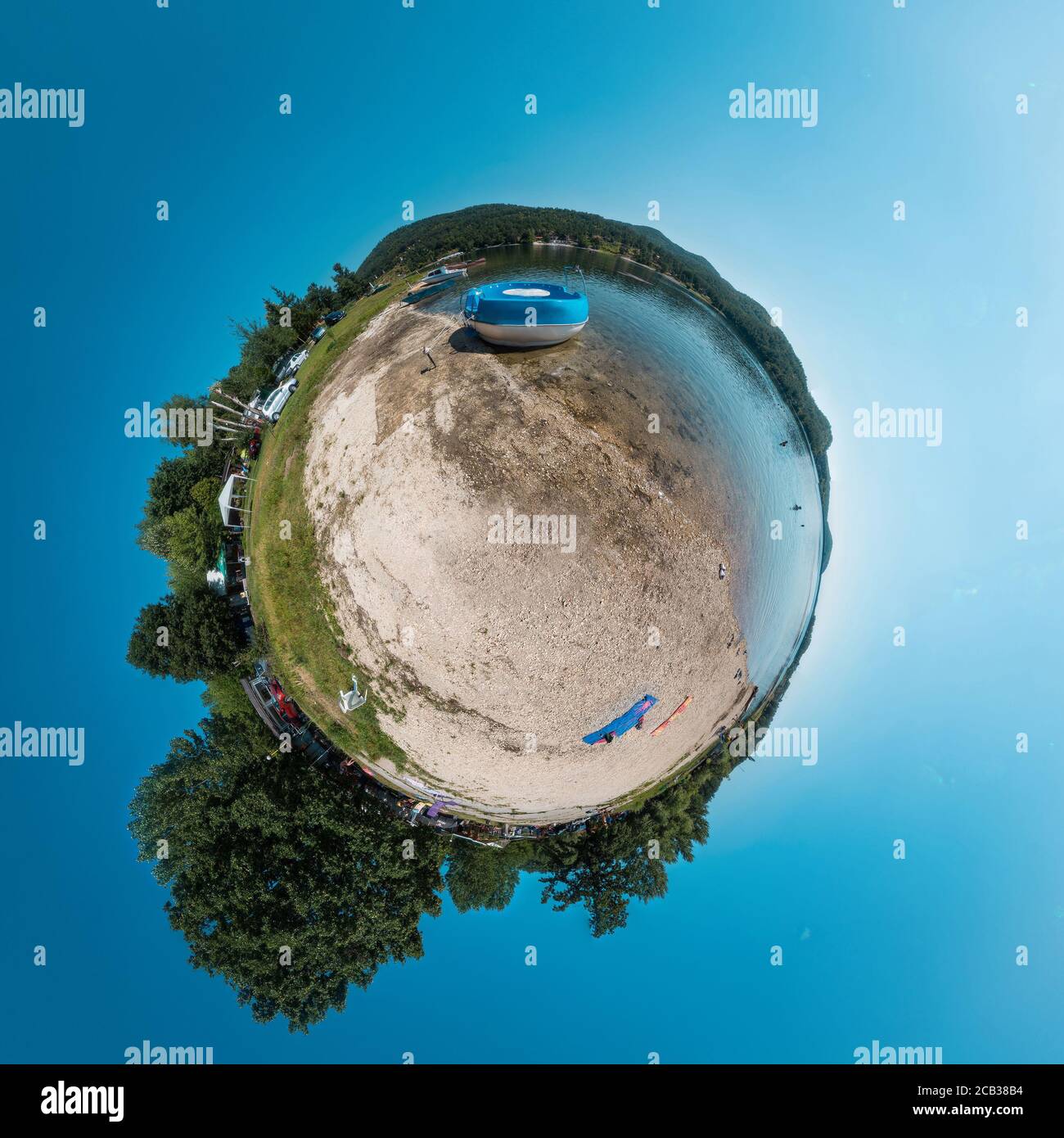 Little planet panoramic projection of lake beach Stock Photo