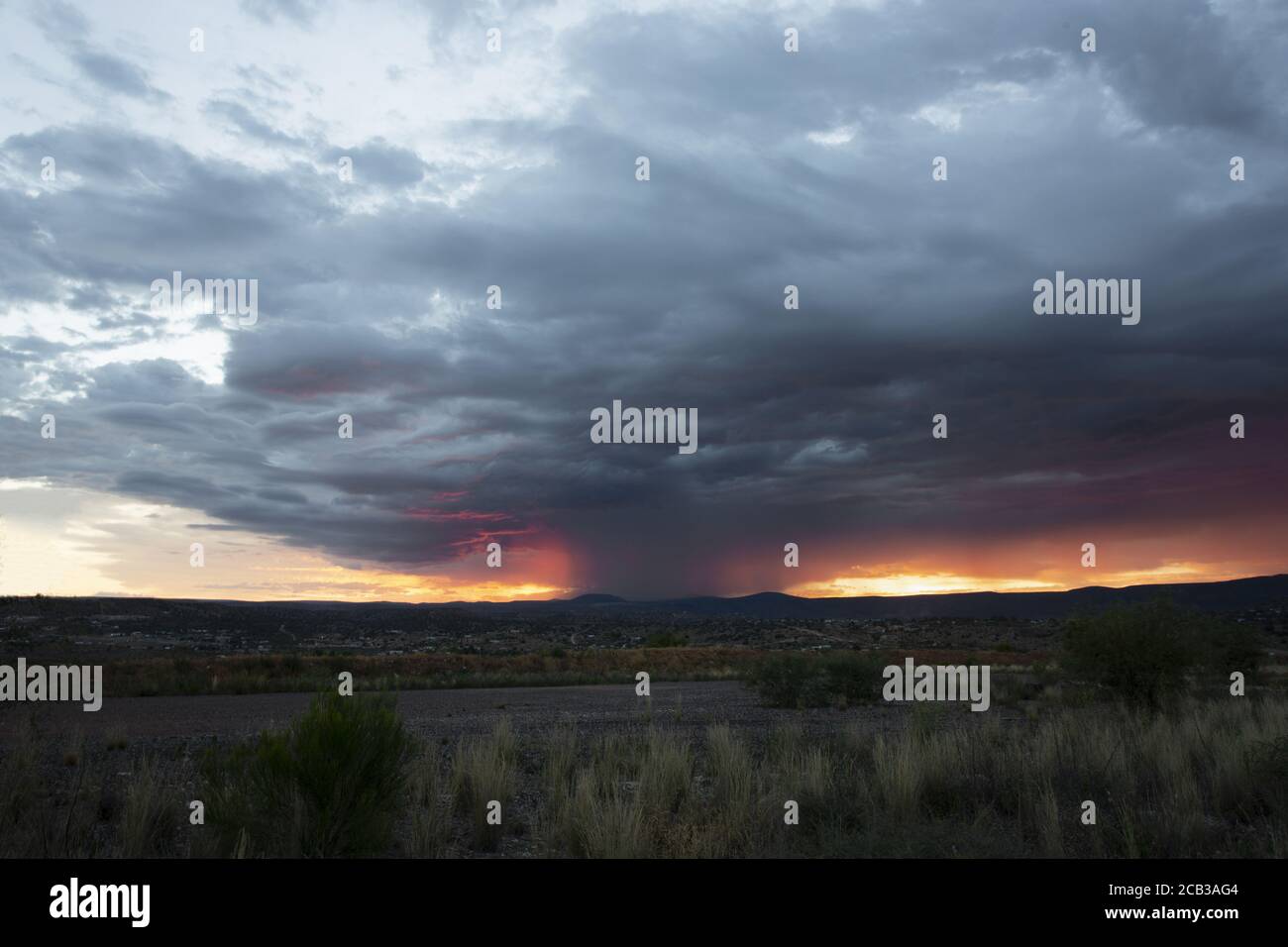 Spectacular Sunrise Behind Monsoon Storm Stock Photo