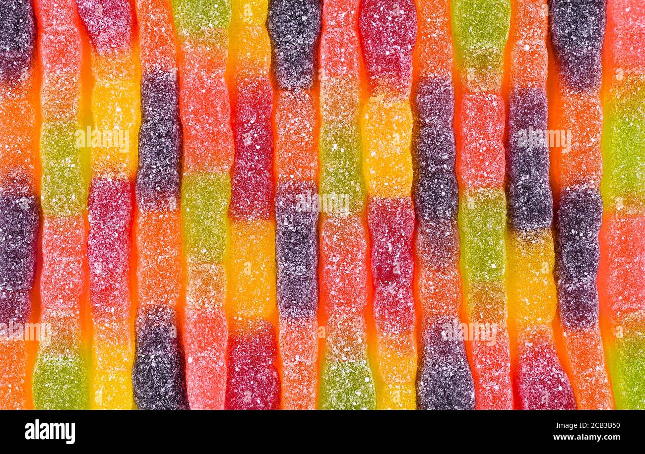 Bright jelly worms background. Close up. Candy background. Stock Photo