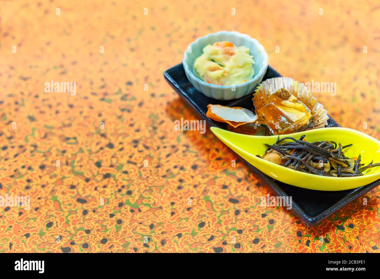 Japanese Traditional Cuisine Of Hijiki Brown Sea Vegetables Nikogori Jellied Fish Aspic Satsuma Age Fried Fishcake And Potato Salad Stock Photo Alamy