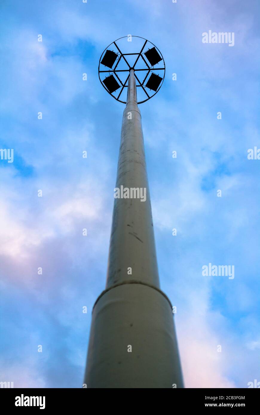 Round and circle with reflectors on the pillar. Blue sky with clouds as copy space Stock Photo