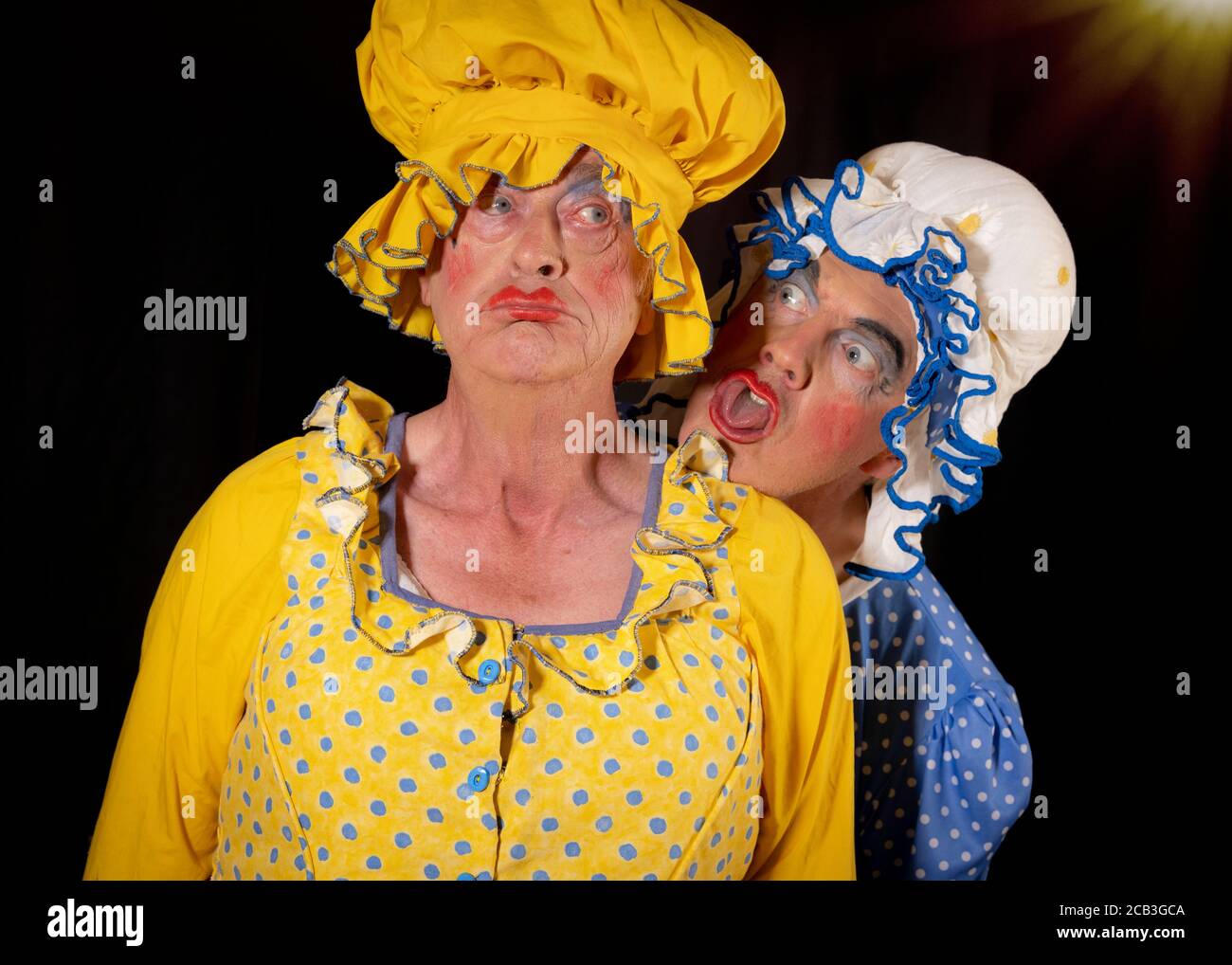 Ugly sisters during an amateur dramatic society production of Cinderella. Stock Photo