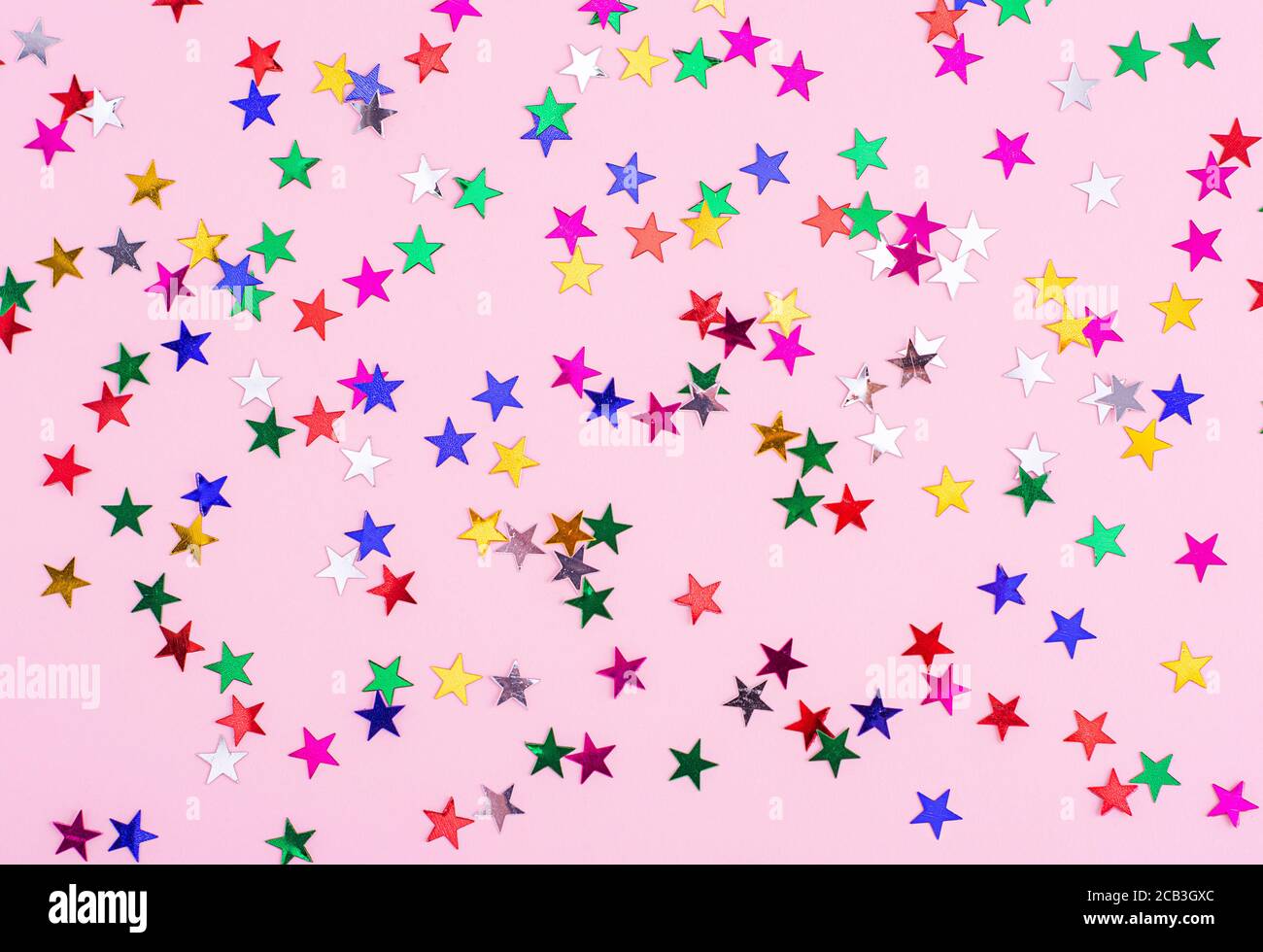 Pink background decorated with stars, christmas background, paper for a present Stock Photo