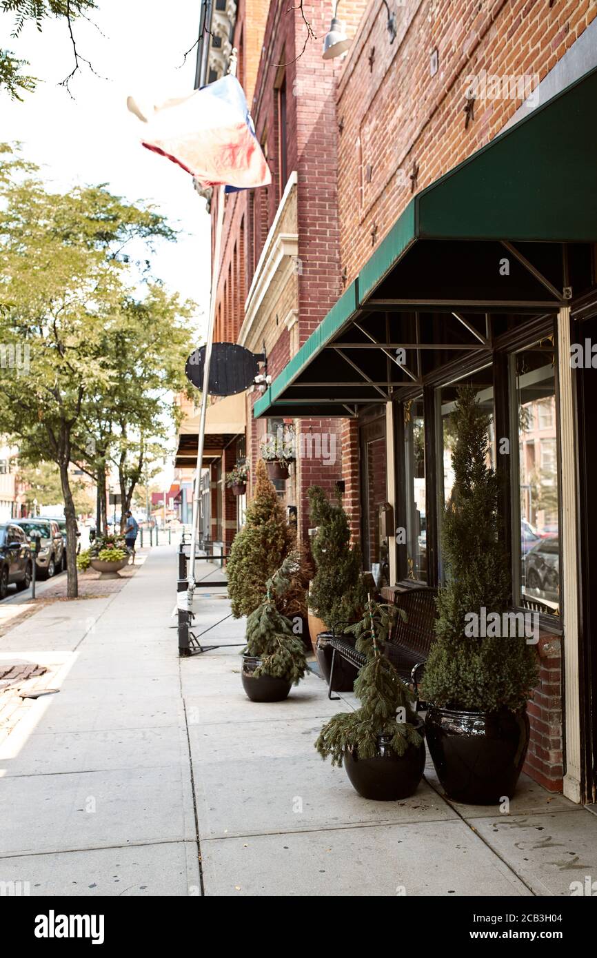 Red brick storefronts along the Riverfront Park neighborhood of