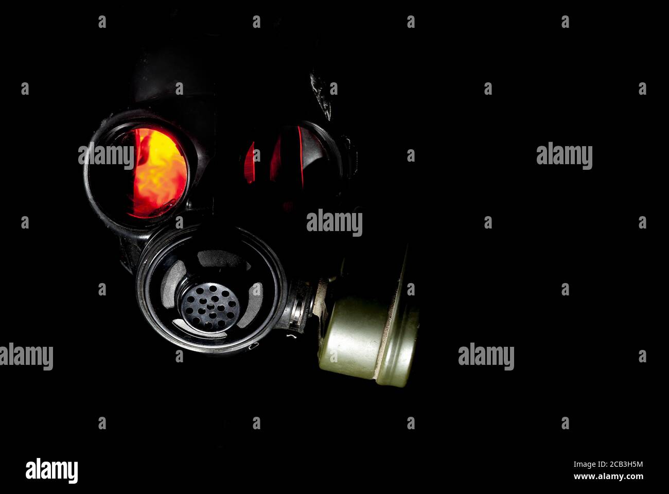 Creepy gas mask costume illuminated from inside Stock Photo Alamy