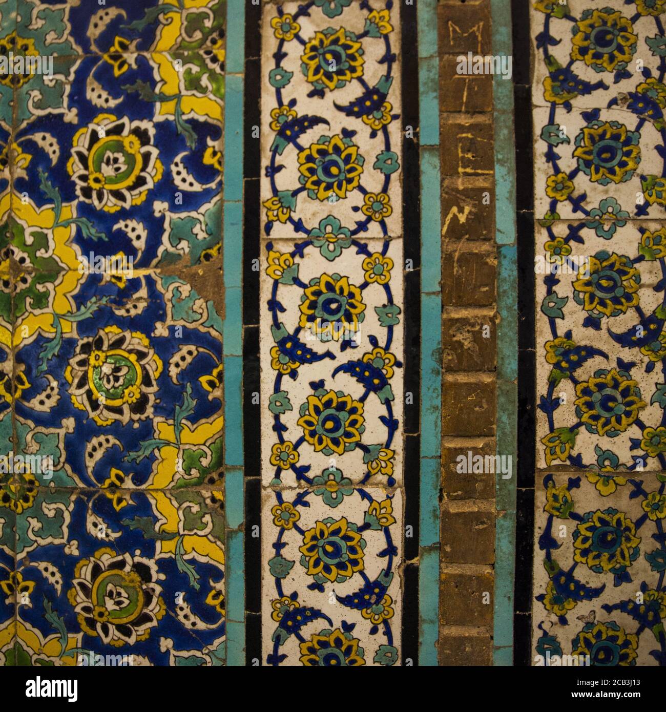 Ceramic wall texture with painted colorful patterns Stock Photo