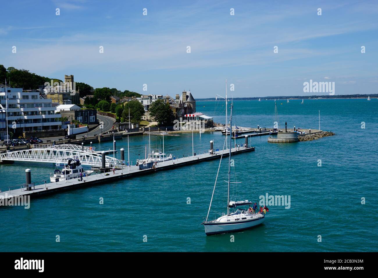 Cowes, Isle of Wight, UK. July 22, 2020. The Royal Yachting headquarters and Royal moorings taken from the Southampton ferry at Cowes on the Isle of W Stock Photo