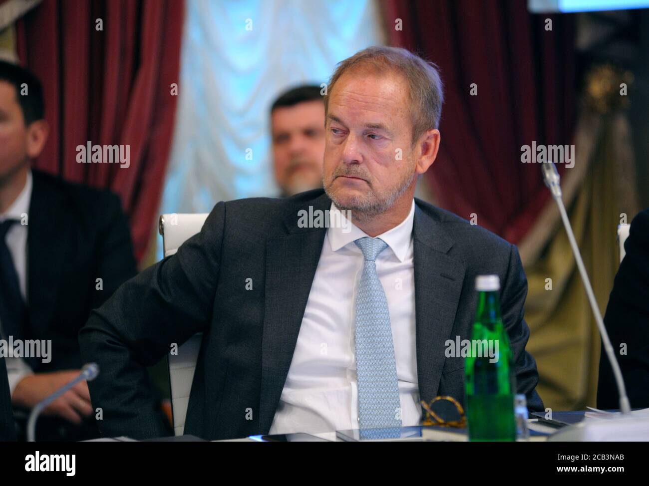 Gert-Jan van den Akker, the Senior Head of Regions of Louis Dreyfus Company B.V., listening to speaker Stock Photo