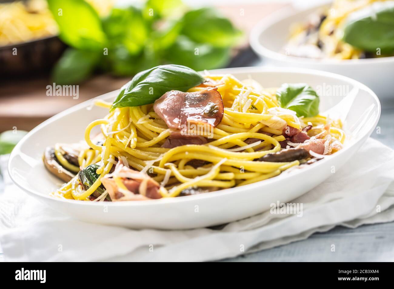 Italian pasta spaghetti prosciutto mushrooms parmesan and olive oil