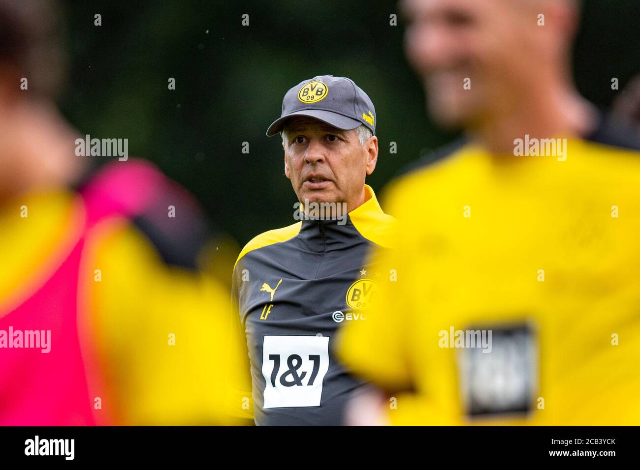 Bad Ragaz, Switzerland. 10th Aug, 2020. Football: Bundesliga, training camp  of Borussia Dortmund. Coach Lucien Favre watches the training. Credit:  David Inderlied/dpa - IMPORTANT NOTE: In accordance with the regulations of  the