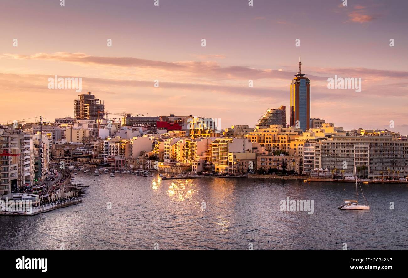 St Julian's bay (sunset) Sliema, Malta Stock Photo