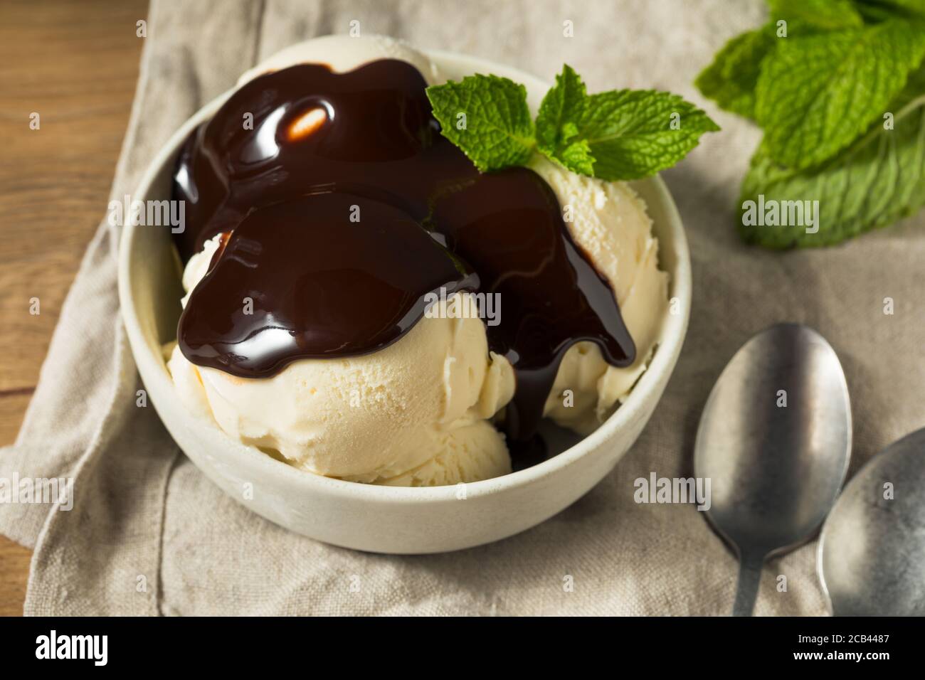 Homemade Frozen Vanilla Ice Cream With Chocolate Syrup Stock Photo