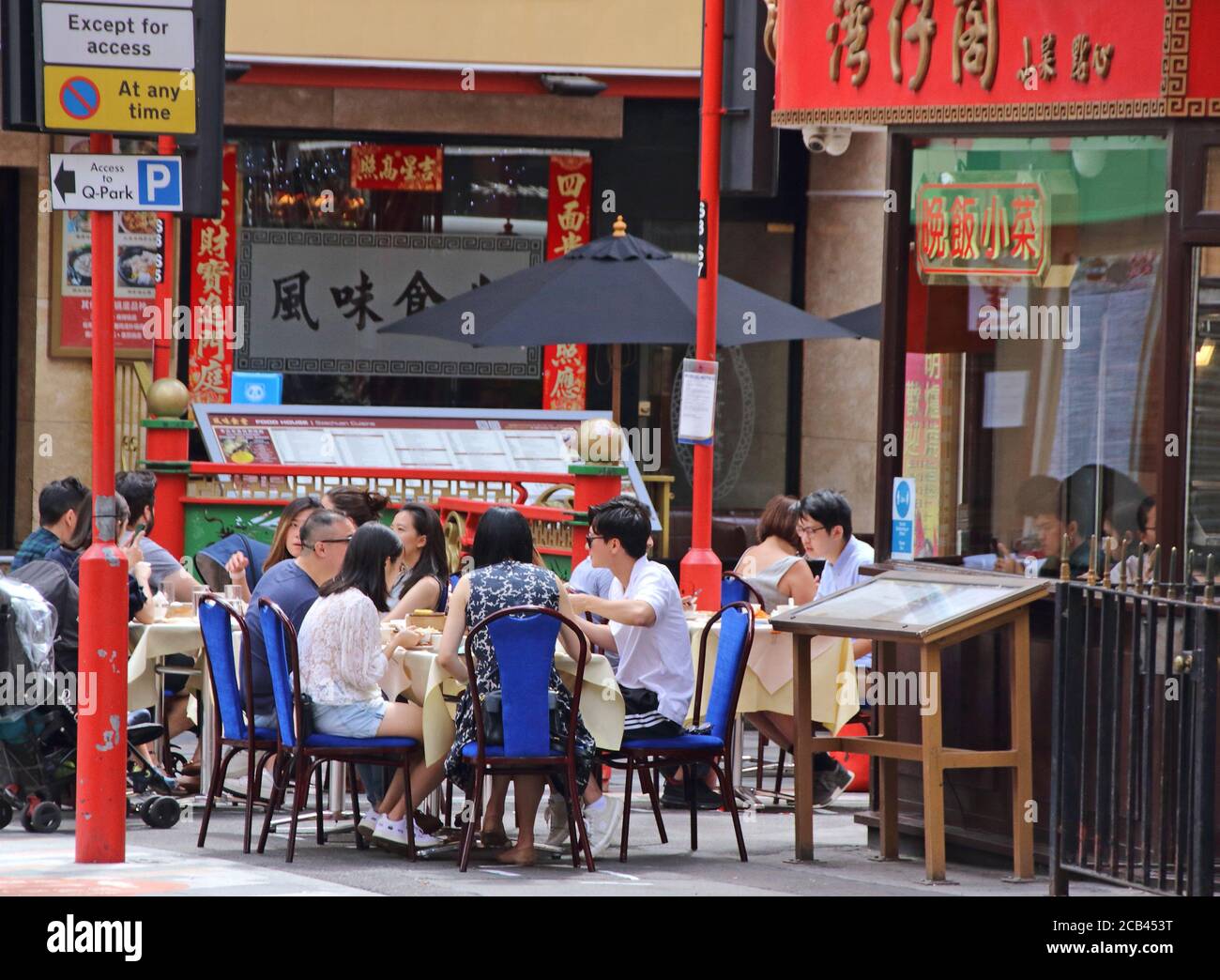 London. UK. A far cry from the empty, desolate streets of lockdown days due to the Cornavirus pandemic, London's Chinatown has embraced the new outdoor dining culture and the streets are busier and restaurants doing good business again in Gerrard Street, London. 1st August 2020. Ref:LMK73-S3075-020820 Keith Mayhew/Landmark Media  WWW.LMKMEDIA.COM. Stock Photo