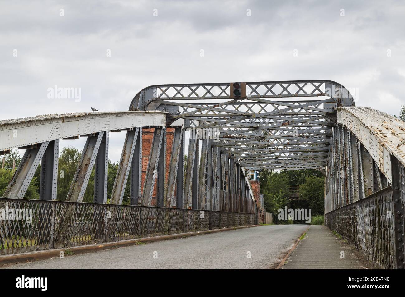 Rivets and rust on the steel Moore Lane swing bridge seen spanning the Manchester Ship Canal in
