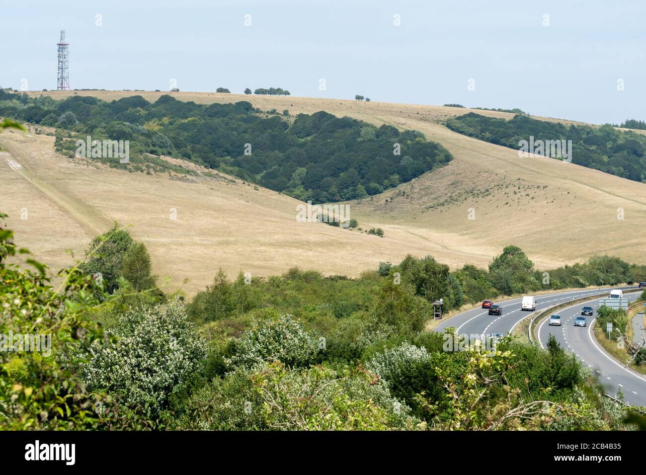View of Butser Hill in the South Downs national Park and part of the Queen Elizabeth Country Park, Hampshire, UK, with the A3 road Stock Photo