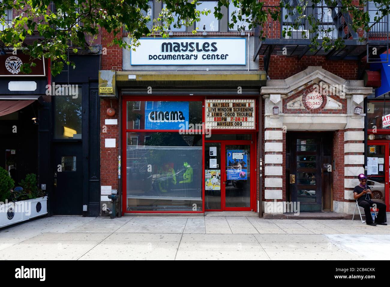 Maysles Documentary Center, 343 Malcolm X Blvd, New York, NYC storefront photo of a theater and arts organization in the Harlem neighborhood. Stock Photo