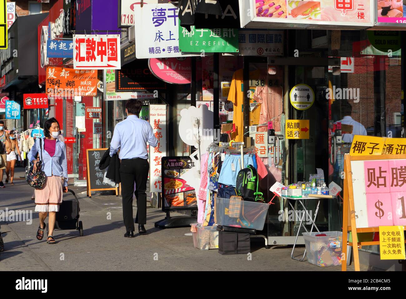 Asian storefronts and signage along Roosevelt Ave in Downtown Flushing, New York, NY. Stock Photo