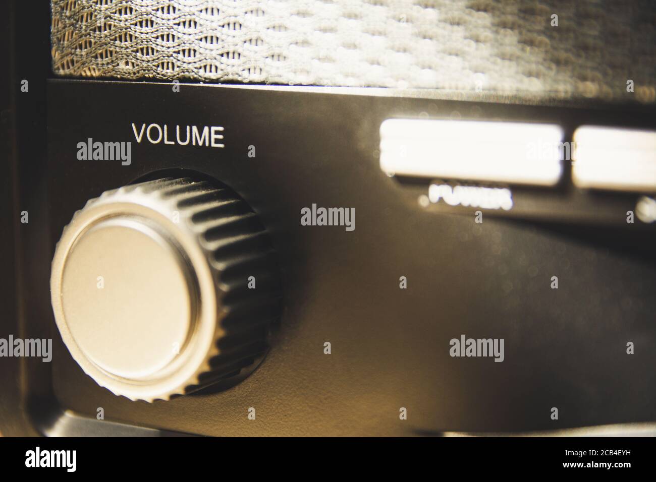 Volume wheel on an old and vintage analog radio. Close-up and detail ...