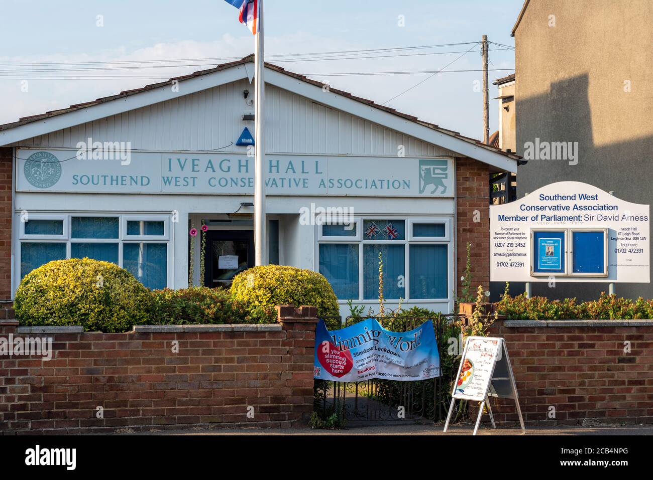 Southend West Conservative Association office, Iveagh Hall. Base of Tory Member of Parliament David Amess. Slimming World signs for adjacent hall Stock Photo