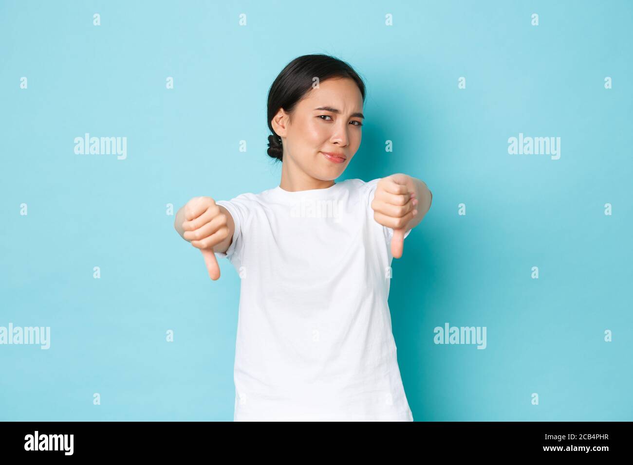 Disappointed and displeased asian girl totally disagree with you ...
