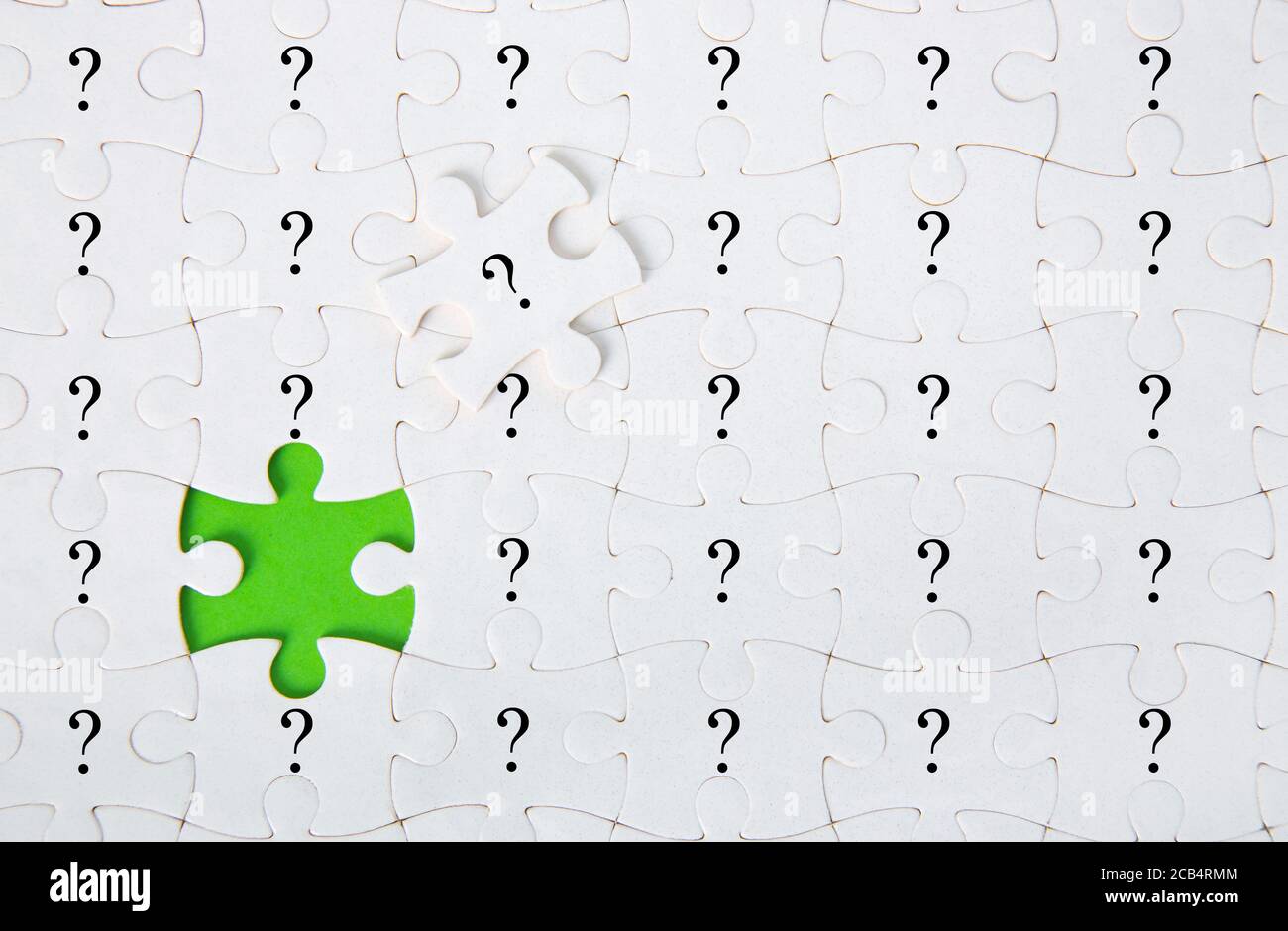 Top view closeup shot of a puzzle with a question mark Stock Photo Alamy