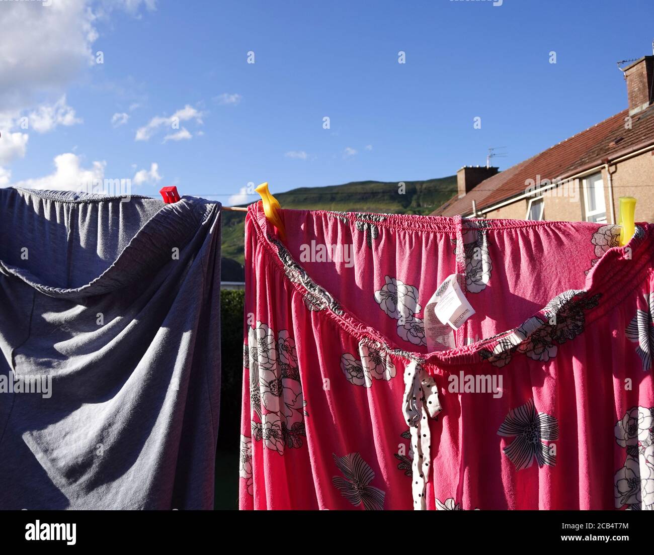 Pyjama bottoms hanging on washing line Stock Photo