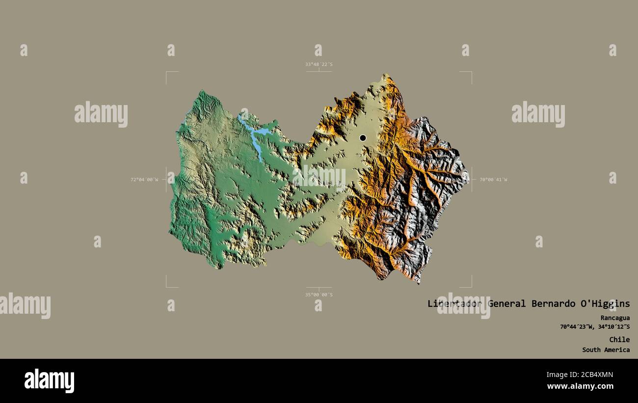 Area of Libertador General Bernardo O'Higgins, region of Chile, isolated on a solid background in a georeferenced bounding box. Labels. Topographic re Stock Photo