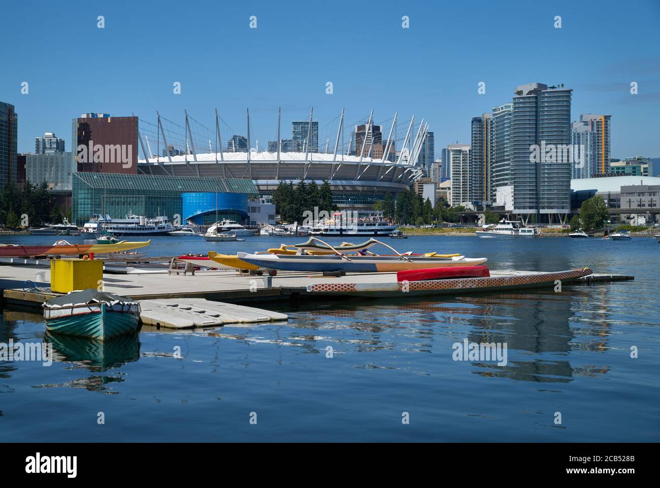 Dragon Boats on Dock Vancouver. Dragon Boats on the dock in Vancouver’s False Creek. Stock Photo