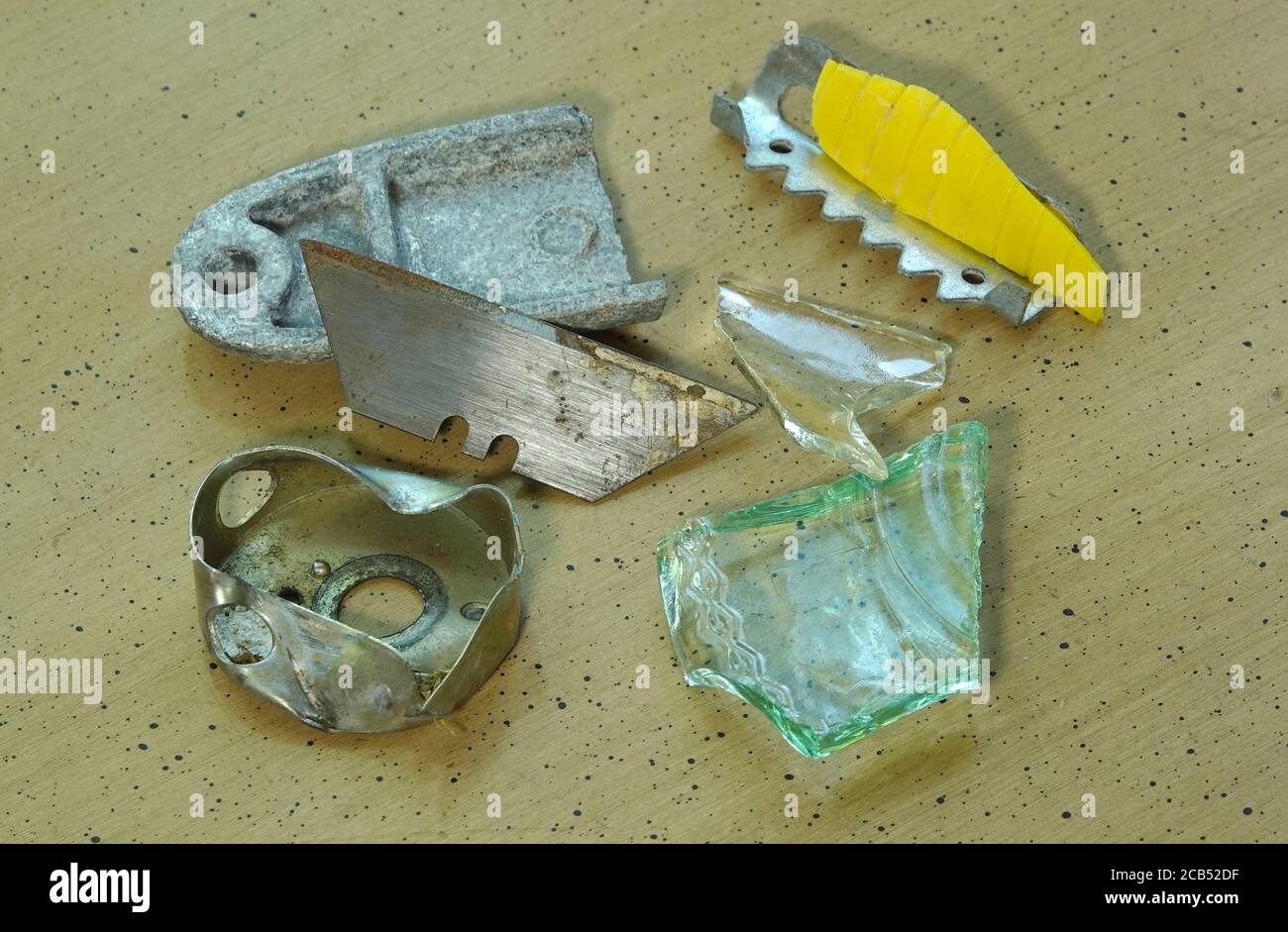 Various sharp objects used for self harm, found in a teen's room. Stock Photo