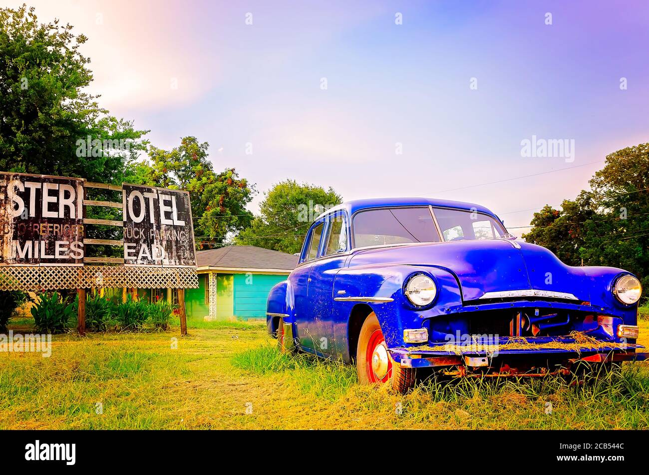 A 1952 Plymouth Cambridge antique car sits abandoned along Highway 61 in the Mississippi Delta