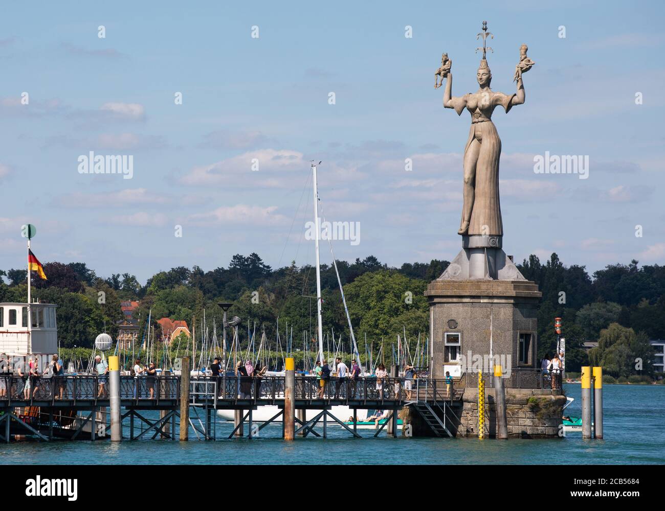 Konstanz, Germany. 04th July, 2020. The statue 'Imperia' by the artist Peter Lenk is located in the harbour of Constance on Lake Constance. The concrete statue incarnates a courtesan and satirically picks up the Council of Constance at the beginning of the 15th century. (to dpa: 'I like Imperia') Credit: Philipp von Ditfurth/dpa/Alamy Live News Stock Photo