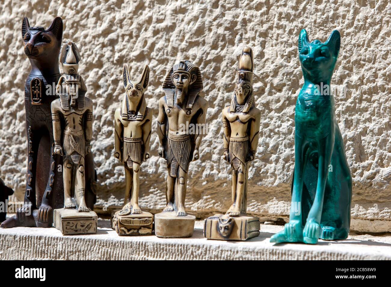 Tourist souvenirs including miniature statues for sale near the Sphinx on the Giza Plateau in