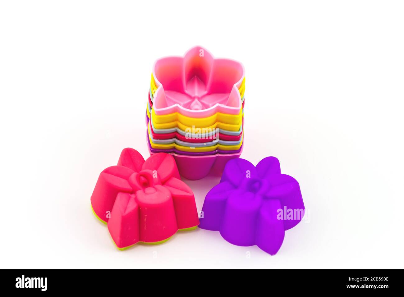 Colorful of silicone molds for baking in the form of hearts, object on a white background Stock Photo