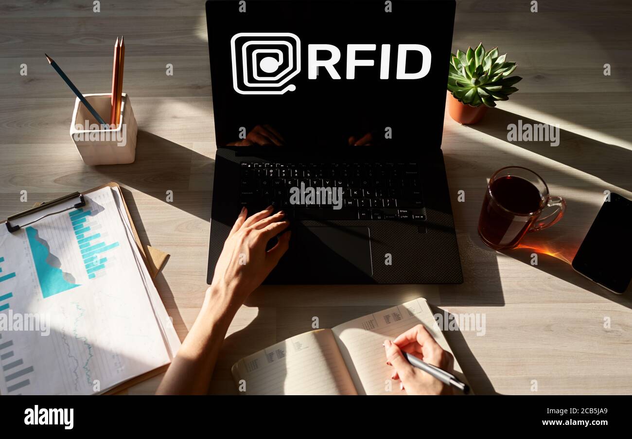 RFID Radio frequency identification technology concept on device screen