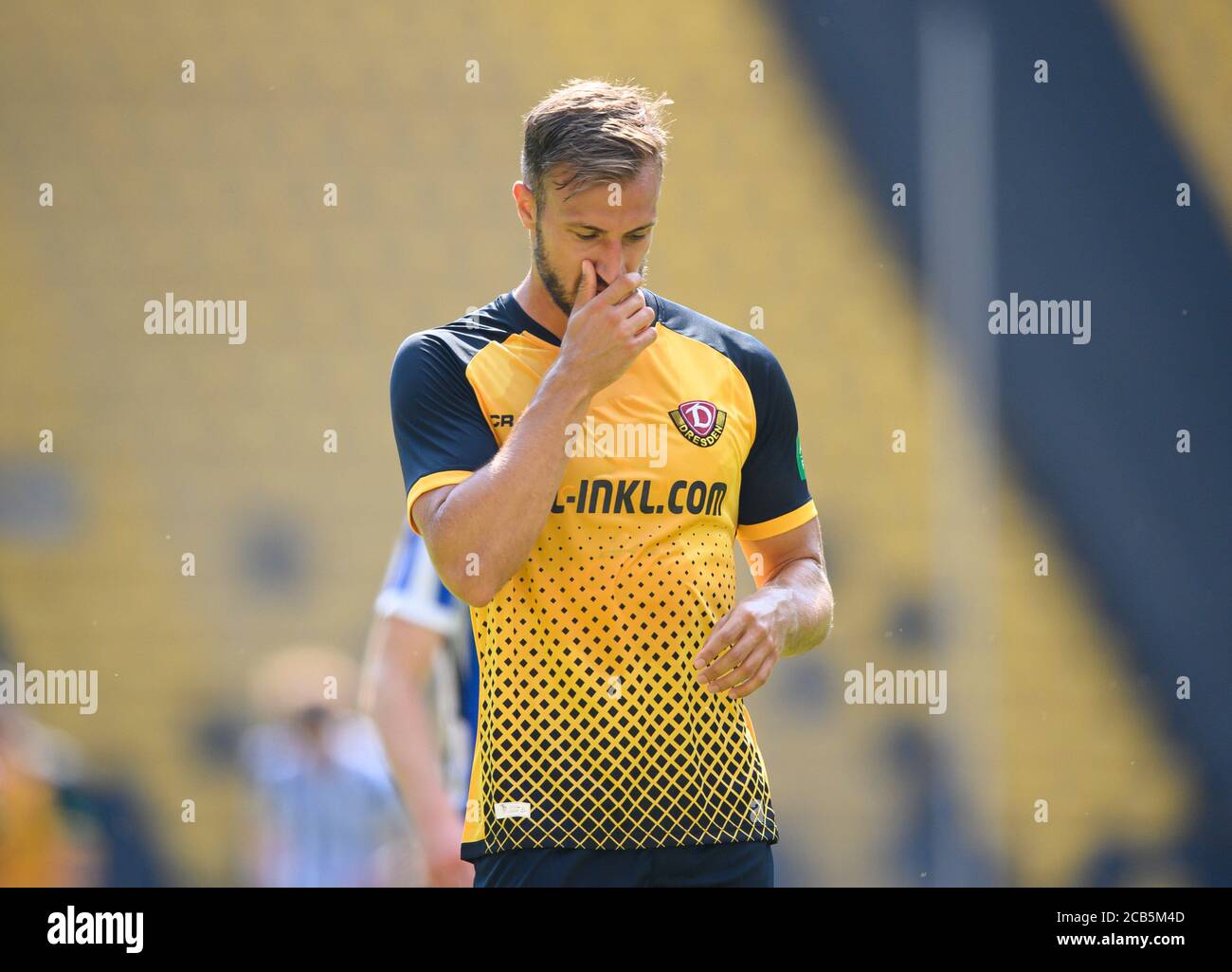 Dresden, Germany. 09th Aug, 2020. Football: 3rd division, test match, SG Dynamo  Dresden - Hertha BSC U23, at the Rudolf-Harbig-Stadium Dynamos Pascal Sohm  thoughtful. Credit: Robert Michael/dpa-Zentralbild/dpa/Alamy Live News  Stock Photo -