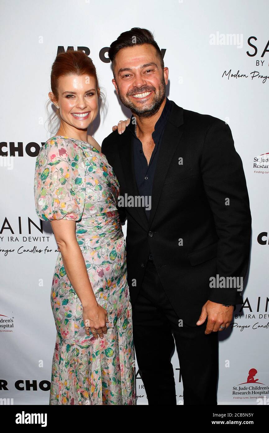 LOS ANGELES - JUN 4:  Joanna Garcia Swisher, Nick Swisher at the SAINT Modern Prayer Candles For A Cause Launch at the Mr. Chow on June 4, 2019 in Beverly Hills, CA Stock Photo