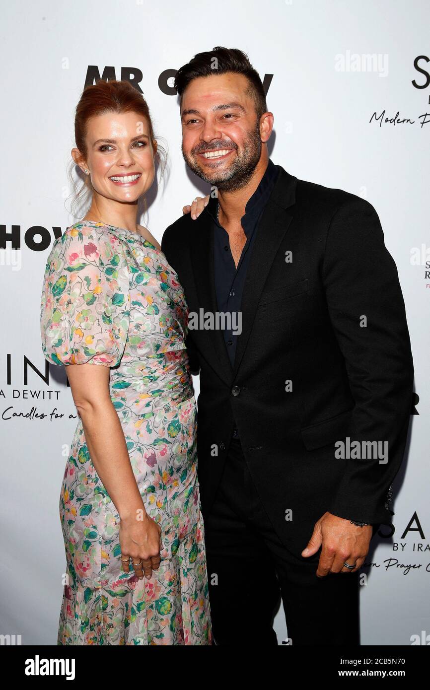 LOS ANGELES - JUN 4:  Joanna Garcia Swisher, Nick Swisher at the SAINT Modern Prayer Candles For A Cause Launch at the Mr. Chow on June 4, 2019 in Beverly Hills, CA Stock Photo