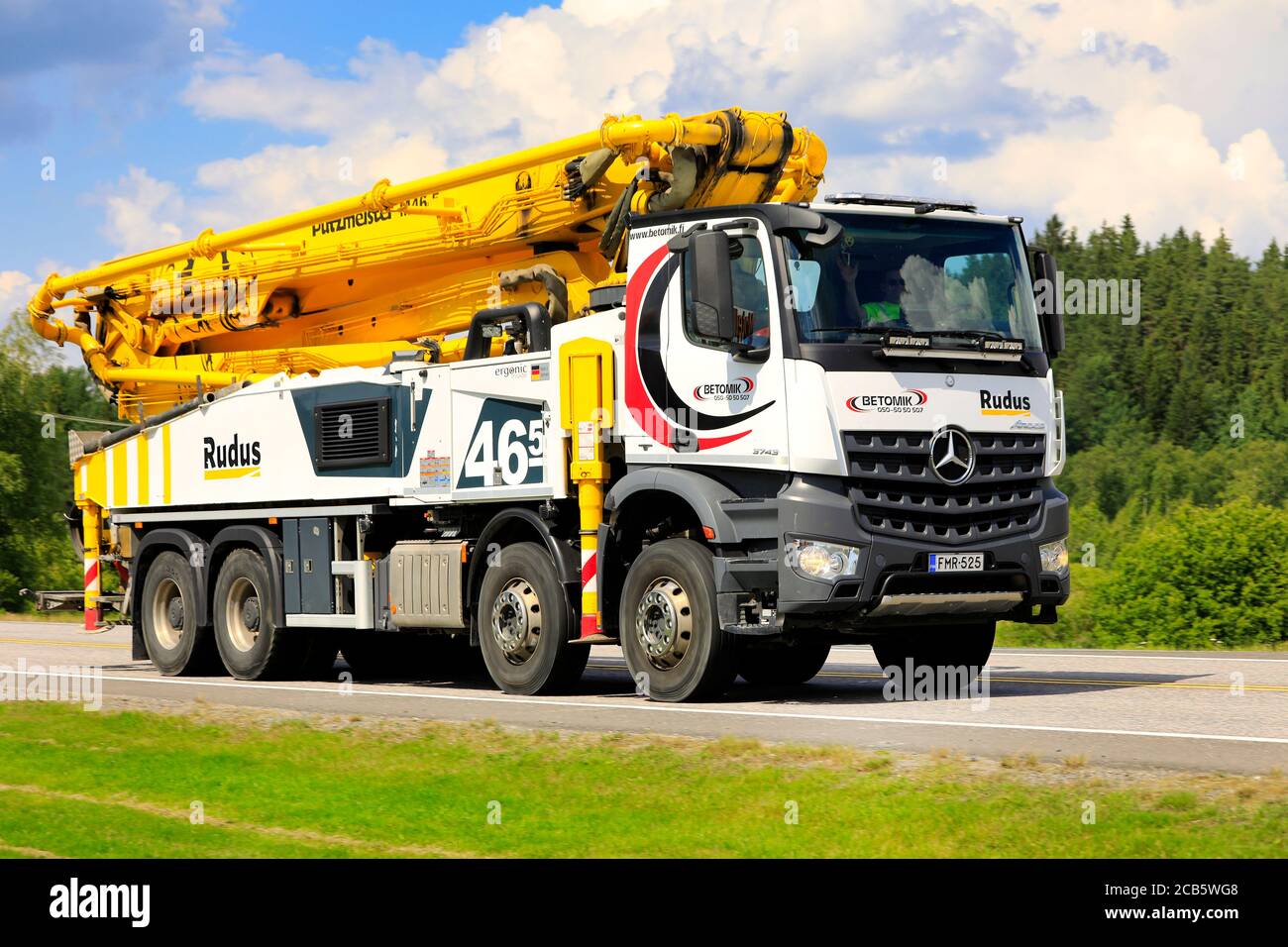 White Mercedes-Benz Arocs 3743 Putzmeister concrete pump truck of Betomik Oy at speed on Highway 2 in Forssa, Finland. July 17, 2020. Stock Photo