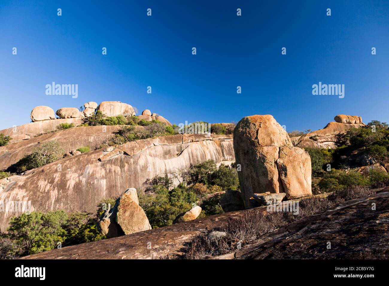Matobo hills, natural granite rockbed at trekking to Bambata cave, Matobo National Park, suburbs of Bulawayo, Matabeleland South, Zimbabwe, Africa Stock Photo