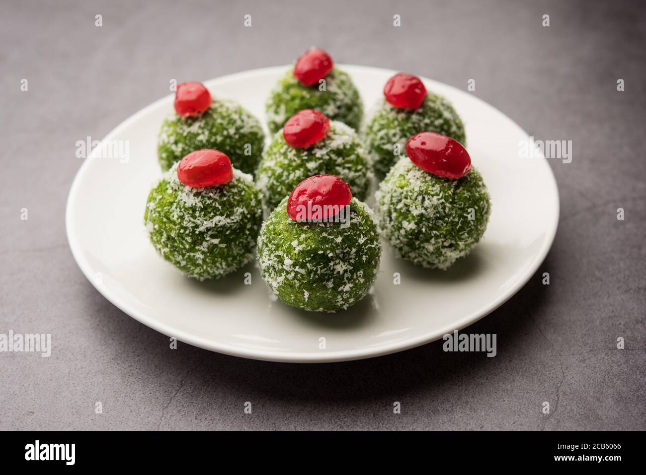 Paan Coconut Laddu or Ladoo - Betel Leaves mixed with Nariyal and sugar to make sweet Balls having Pan Flavour Stock Photo