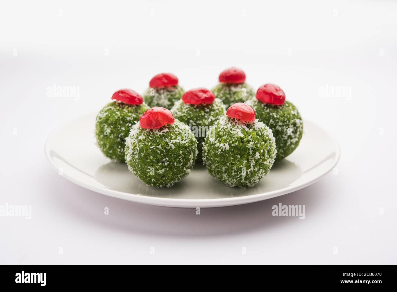 Paan Coconut Laddu or Ladoo - Betel Leaves mixed with Nariyal and sugar to make sweet Balls having Pan Flavour Stock Photo