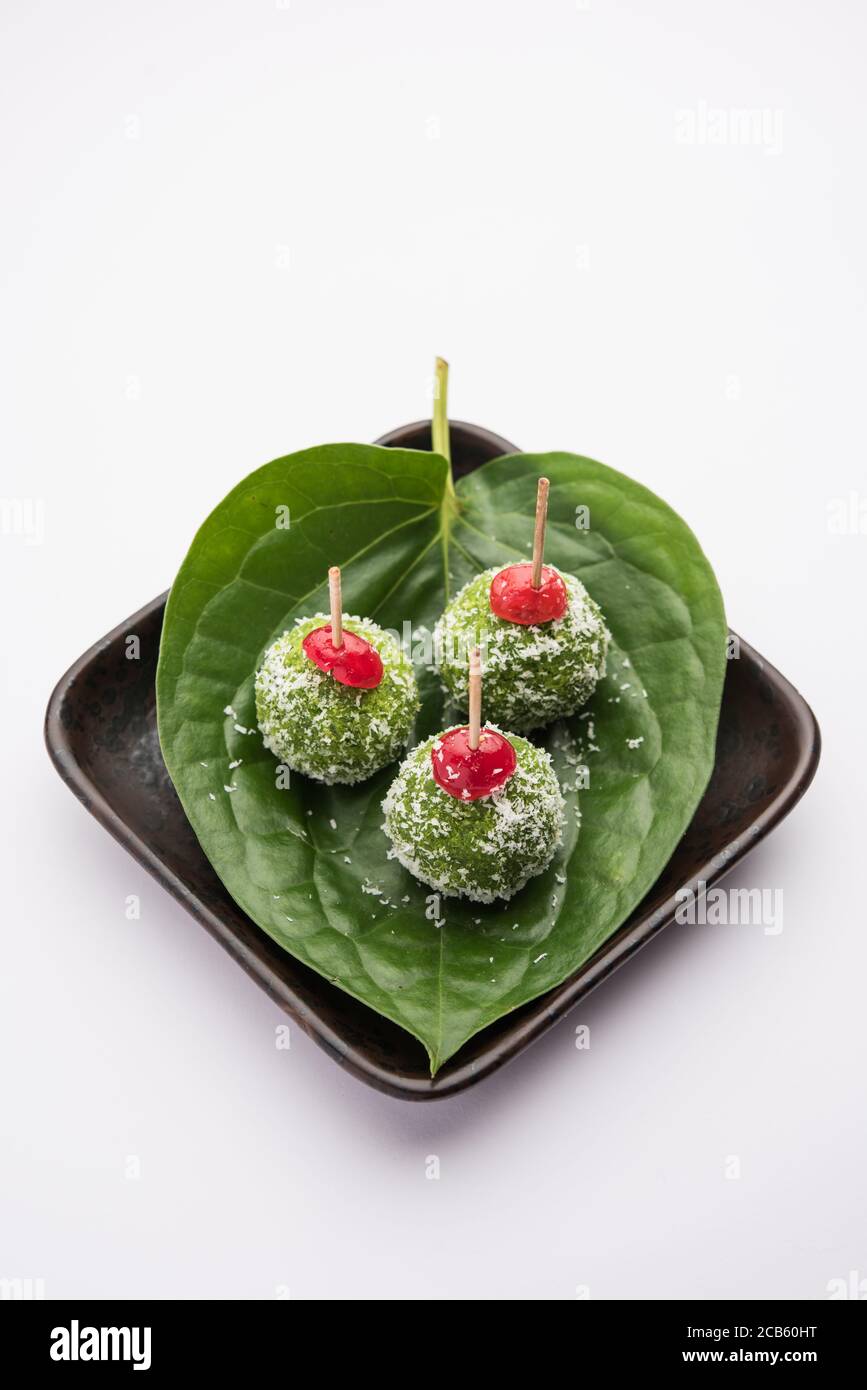 Paan Coconut Laddu or Ladoo - Betel Leaves mixed with Nariyal and sugar to make sweet Balls having Pan Flavour Stock Photo