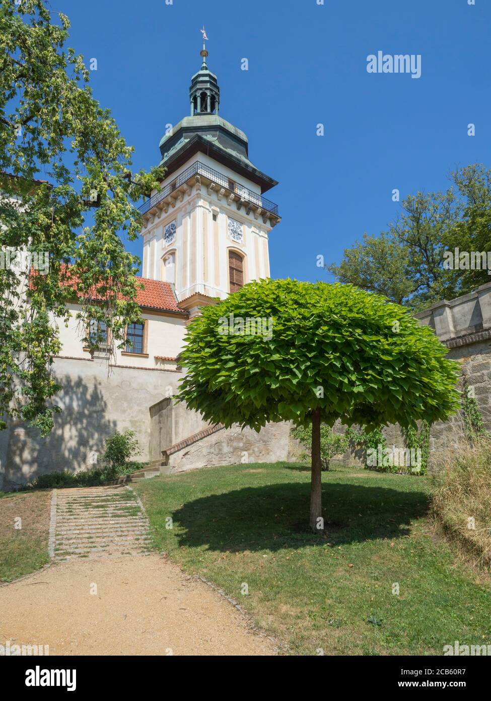 old town hall tower in castle park Benatky nad Jizerou with footpath