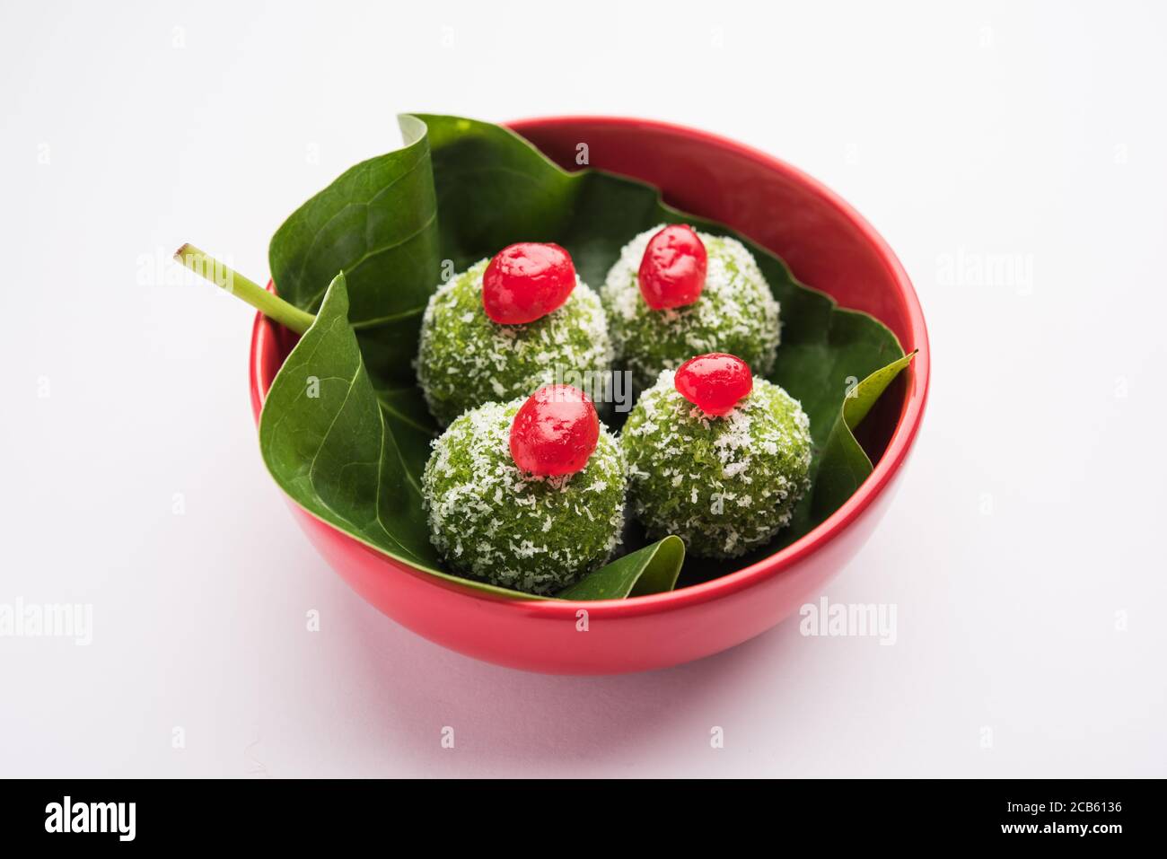 Paan Coconut Laddu or Ladoo - Betel Leaves mixed with Nariyal and sugar to make sweet Balls having Pan Flavour Stock Photo