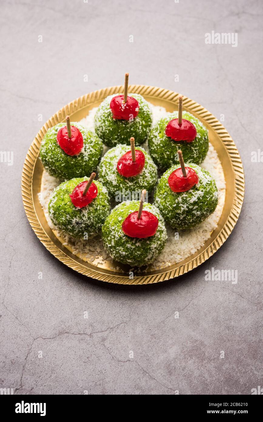 Paan Coconut Laddu or Ladoo - Betel Leaves mixed with Nariyal and sugar to make sweet Balls having Pan Flavour Stock Photo