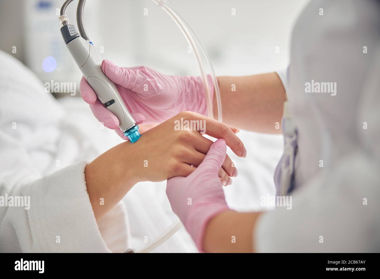 Hand in latex gloves using hi-res stock photography and images - Alamy