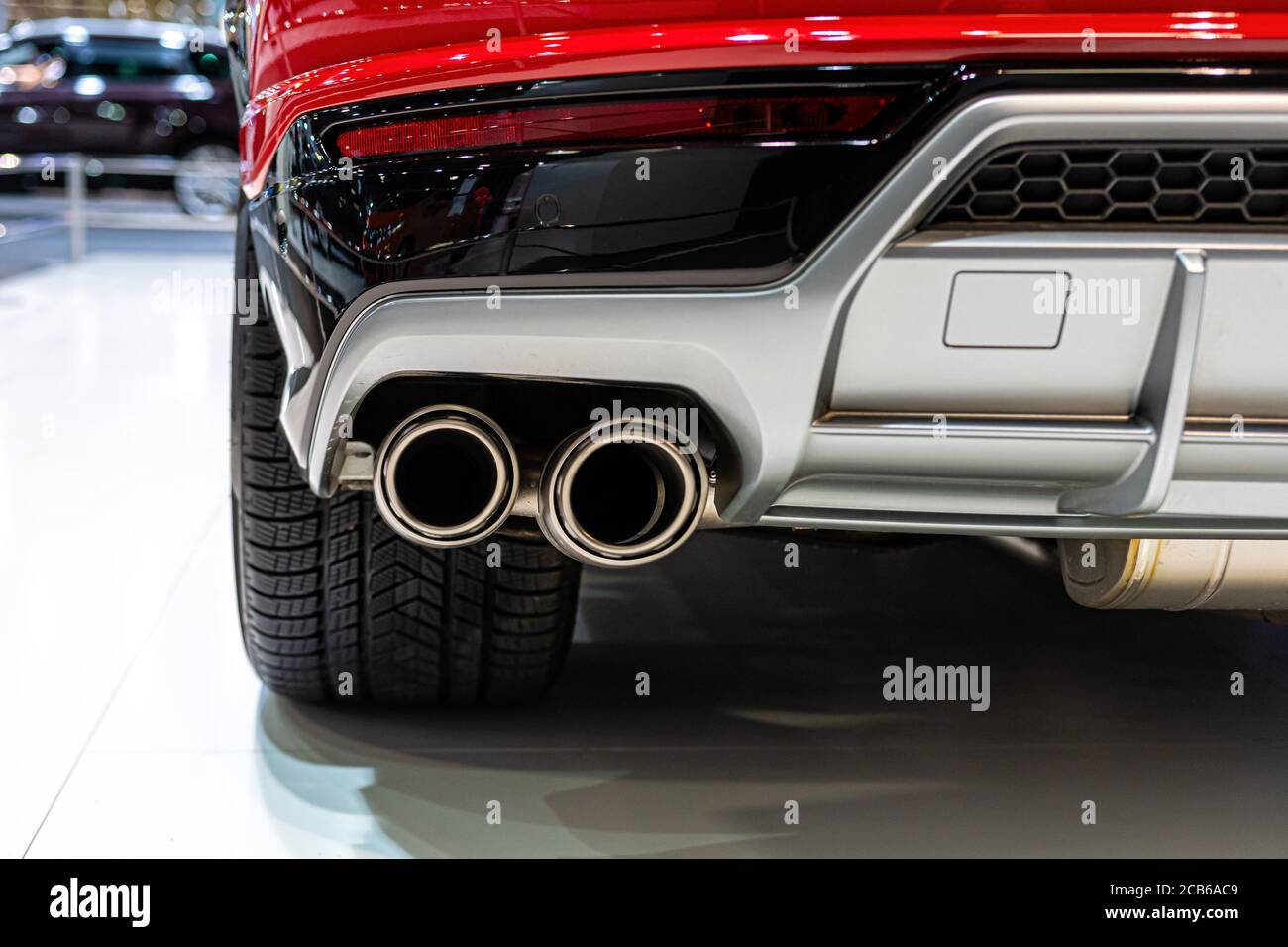 Expensive luxury sports SUV with dual exhaust. Exterior detail close-up - image Stock Photo