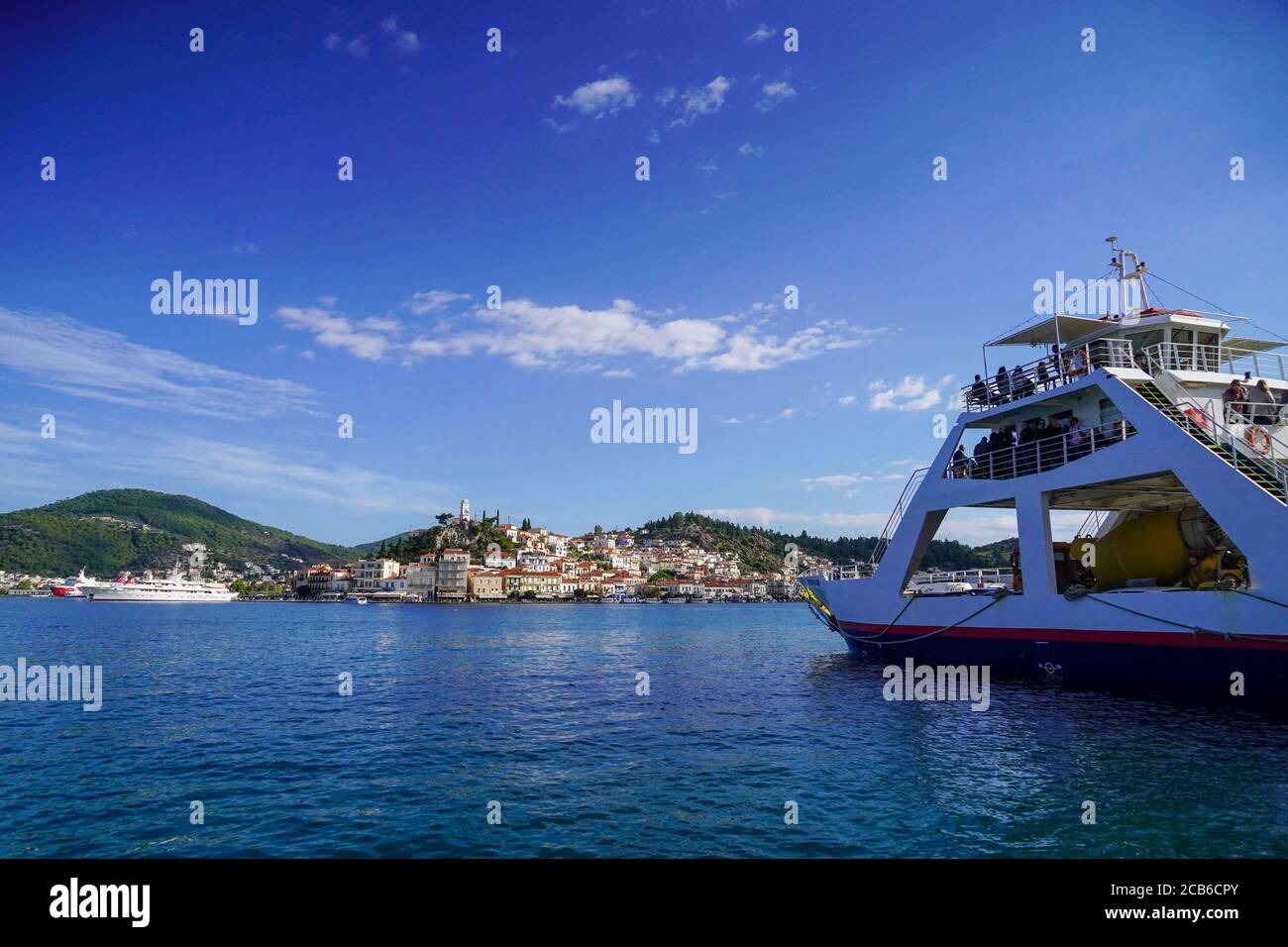 the harbour at Poros is a small Greek island-pair in the southern part of the Saronic Gulf, Greece Stock Photo